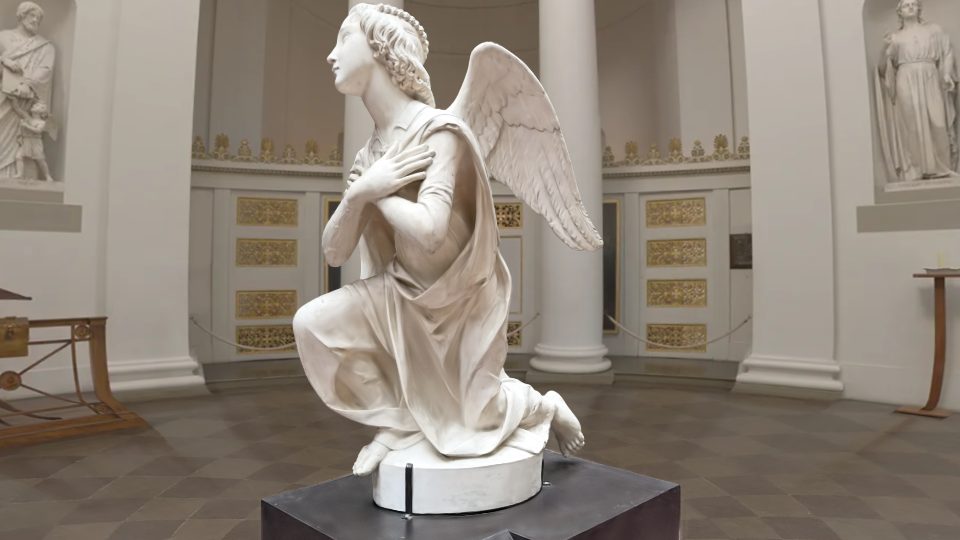 A Gaussian splat capture of a marble angel in a domed hall